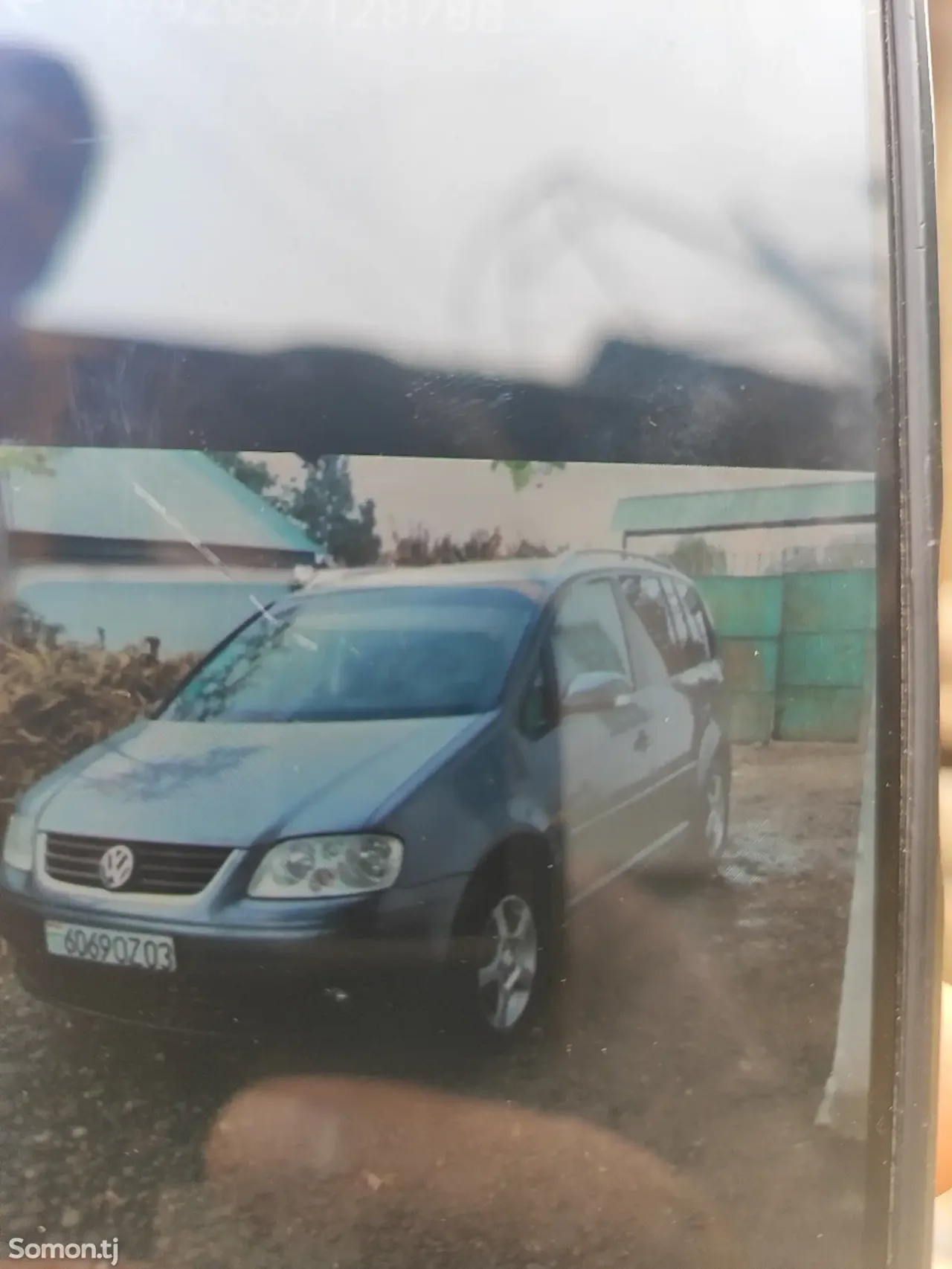 Volkswagen Touran 2006 · 1.6 MT