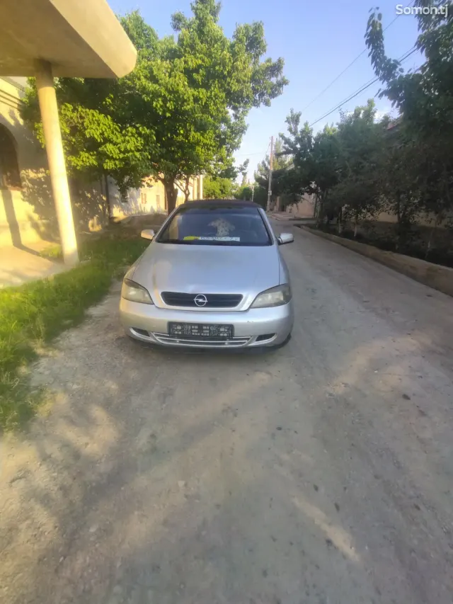 Opel Astra G 2003 · 1.6 MT