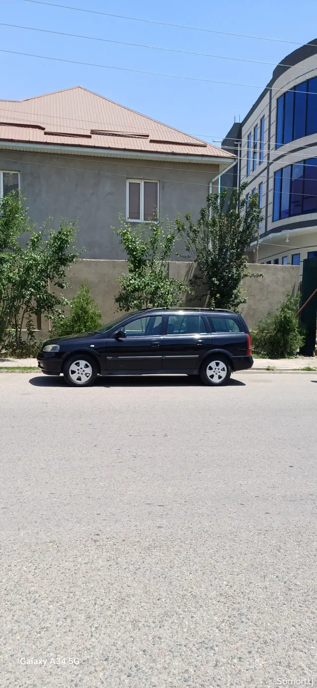Opel Astra G 2003 · 1.6 MT