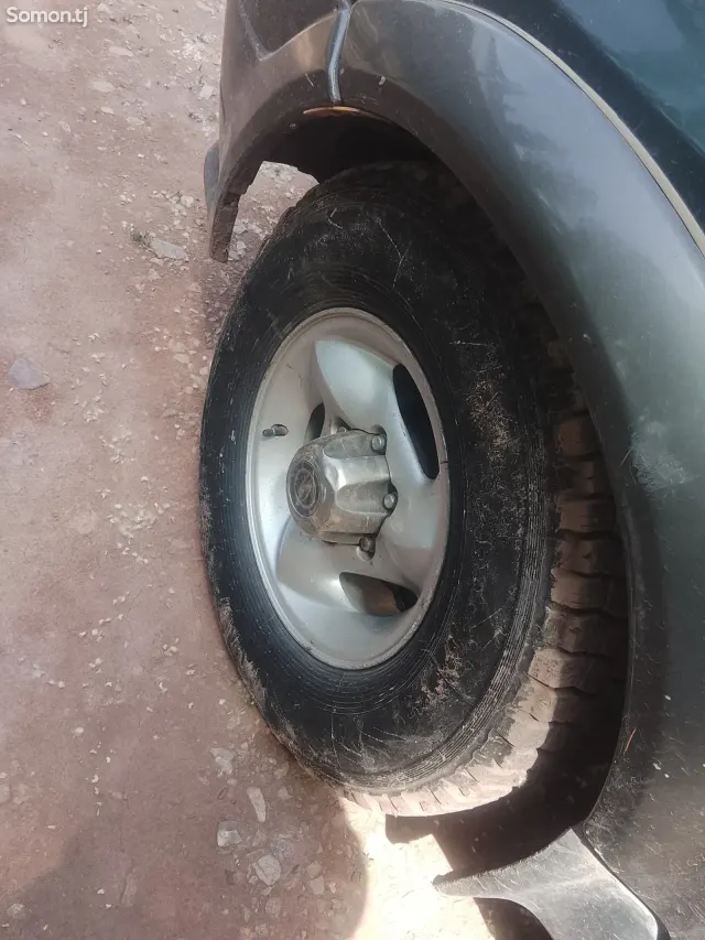 Ssang Yong Musso 1994 · MT