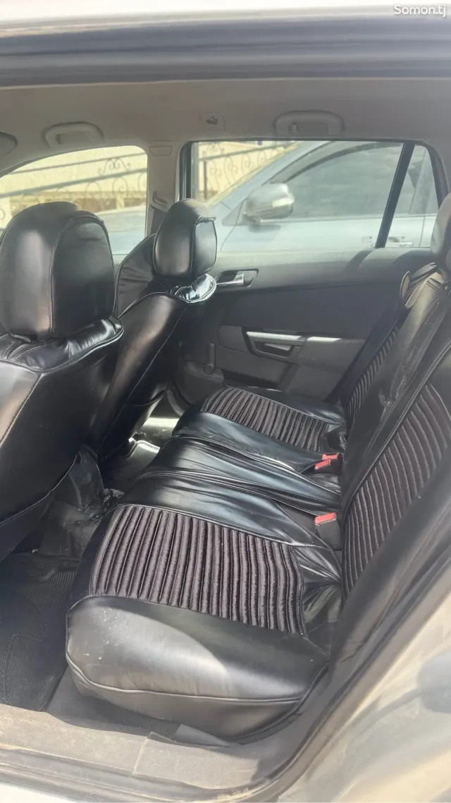 Opel Astra H 2009 · 1.6 MT