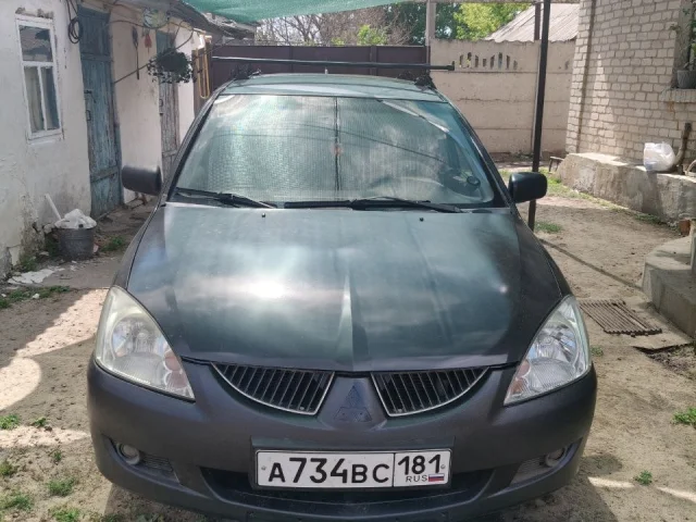Фото: Марка автомобиля: Mitsubishi Lancer