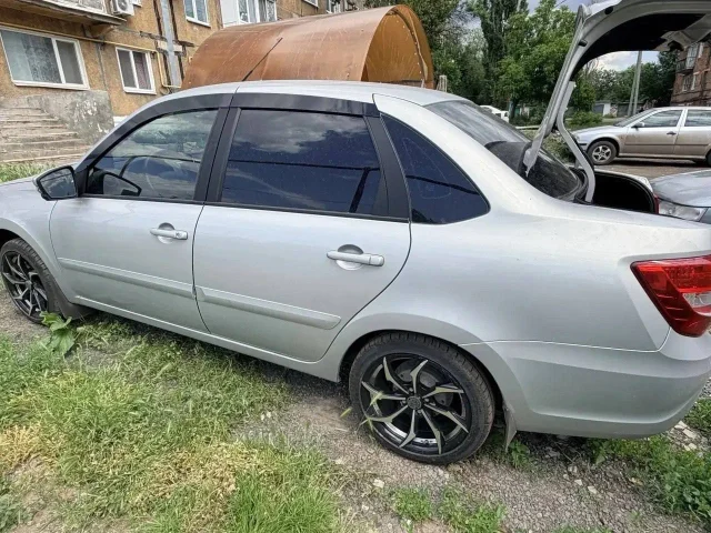 Фото: Продам Лада Гранта Комфорт 2021года,пробег родной 56.000км, я собственник, машина покупалась новой в автосалоне, мотор 1