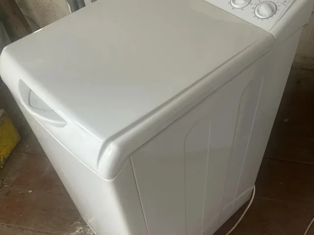 Фото: Стиральная машина Indesit с вертикальной загрузкой