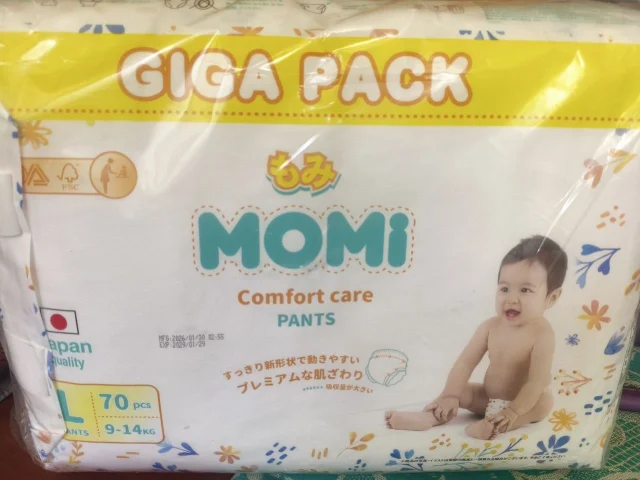 Фото: Продам детские памперсы трусики Momi 70 шт, размер L 9-14 кг, новая запечатанная пачка