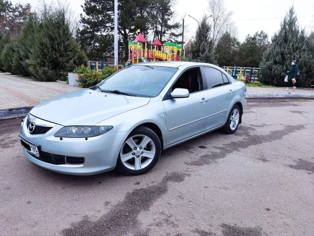Фото: Mazda 6 (лифтбек) 2.0 Газ/бензин 147л.с, декабрь 2006год рестайлинг, КПП мех-6. Пробег 157тыс.(Родной)