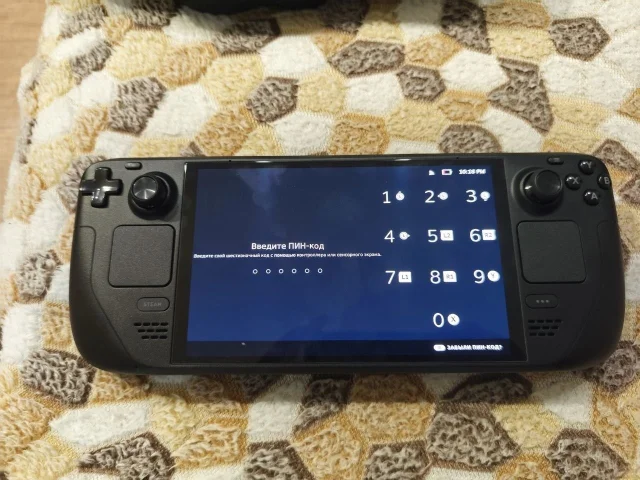 Фото: Продаётся портативная игровая приставка Steam Deck OLED с объёмом памяти 512 ГБ в чёрном цвете. Устройство полностью раб