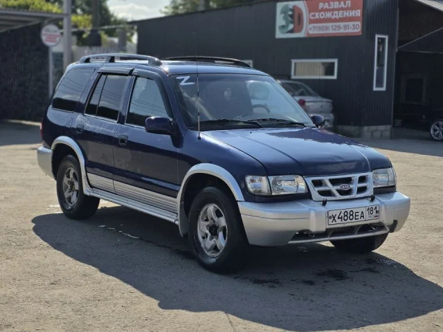 Фото: Марка автомобиля: Kia Sportage