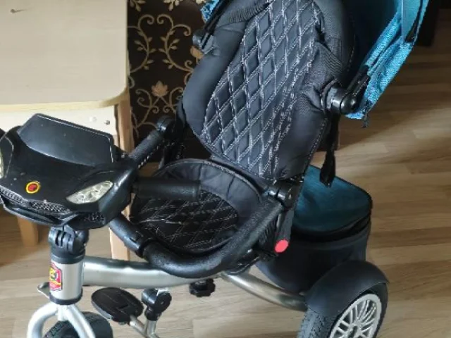 Фото: велосипед с родительской ручкой