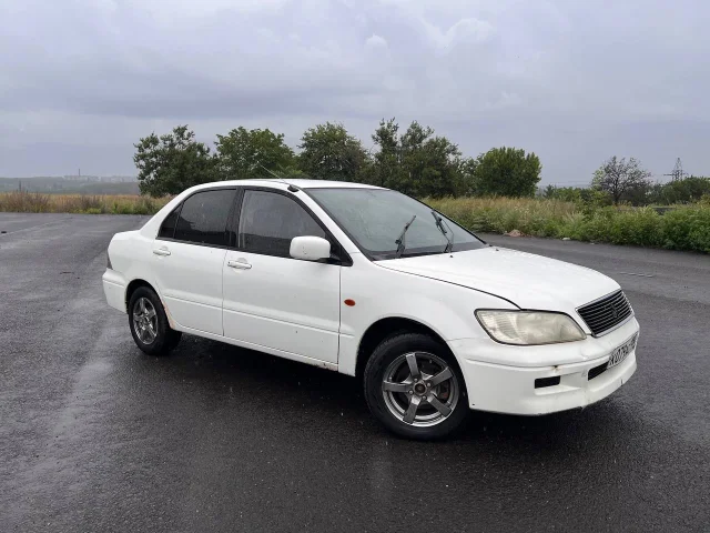 Фото: Lancer cedia 2002г