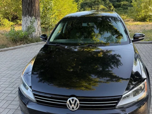 Фото: СРОЧНО!!!!  ЦЕНА 1050000  РУБ.  Volkswagen Jetta VI, 2013, 1.8AT 170 л.с. с пробегом 63359 мили (102000 км.). Кожаный са
