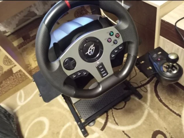 Фото: Продам руль dexp wheelman pro GT вместе с подставкой, всё в идеальном состоянии, брался год назад для себя, подходит что