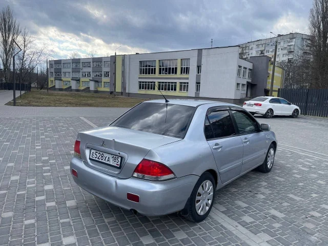 Фото: Продам лансер 2008 г. 1.6. Цена 250тысяч торг. Мотор дымит и ест масло. По ходовке все ок. По кузову на 4