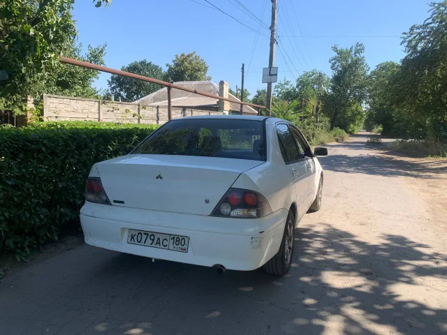 Фото: Lancer cedia 2002г