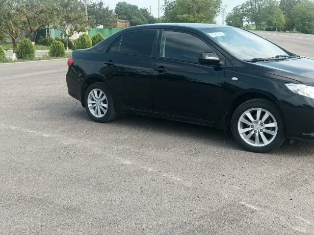 Фото: Продам Toyota Corolla, 1.6., кпп механика 5ст. 2008 г, учёт 2009, газ вписанный,безопасность вся на месте, не битая, два