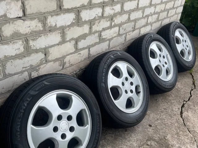 Фото: Продам оригинальные диски на опель с летней резиной без дефектов, R15, разболтовка 5*110, подходит на Zafira A, B, Astra