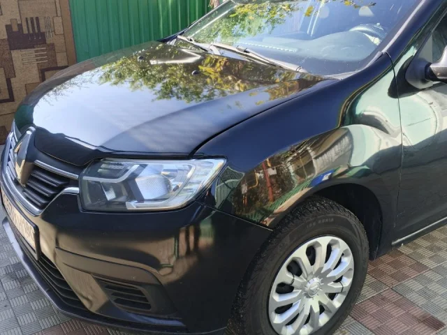Фото: Рено Логан 2015 год 1.6 пробег 210 000 автомобиль на ходу продаётся по самому низу рынка ниже уже некуда стоит новая зим