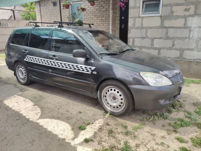 Фото: Марка автомобиля: Mitsubishi lancer