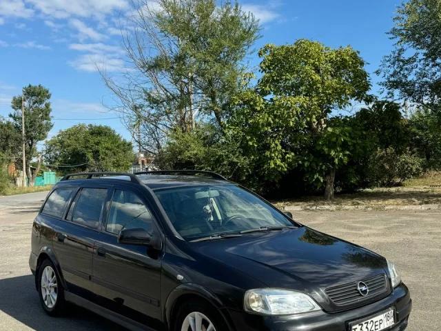 Фото: Opel Astra ( универсал). Год выпуска 2001. Пробег 214 000. Мотор 1.6 16 клапанный( в силу возраста начал поддымливать )