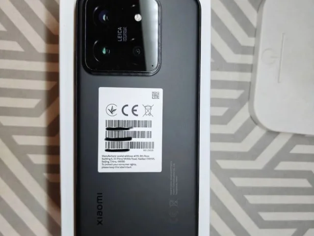 Фото: Xiaomi 14 black 12/256. Телефон в пленке, отличное состояние,  все работает без нареканий. В ремонте  не был. Полный ком