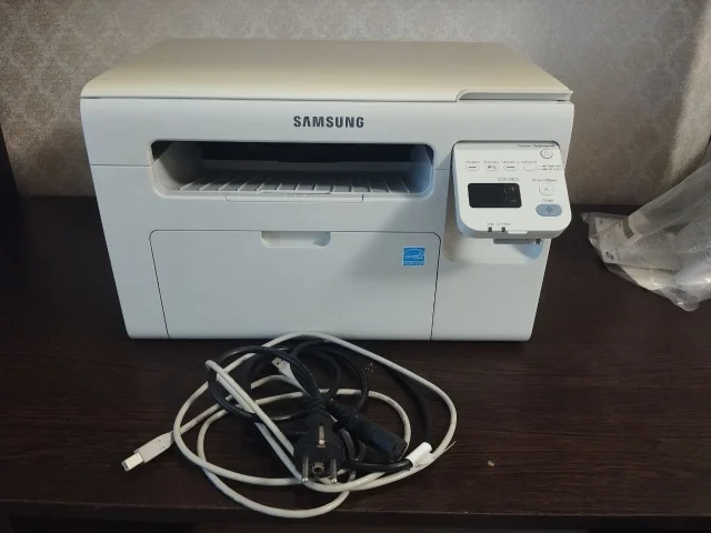 Фото: Продам МФУ Samsung SCX- 3405 б/у в хорошем состоянии. Картридж оригинальный. Цена 5000 руб