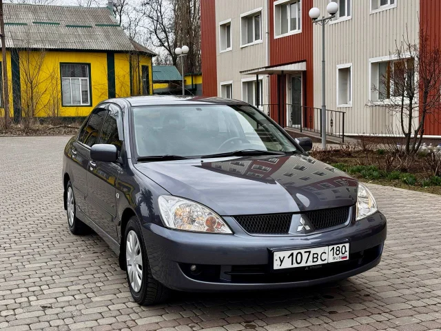 Фото: Продам Mitsubishi Lancer 2008 г двигатель 1.6 коробка механика пяти Ступка родной пробег 130 000 км автомобиль практичес